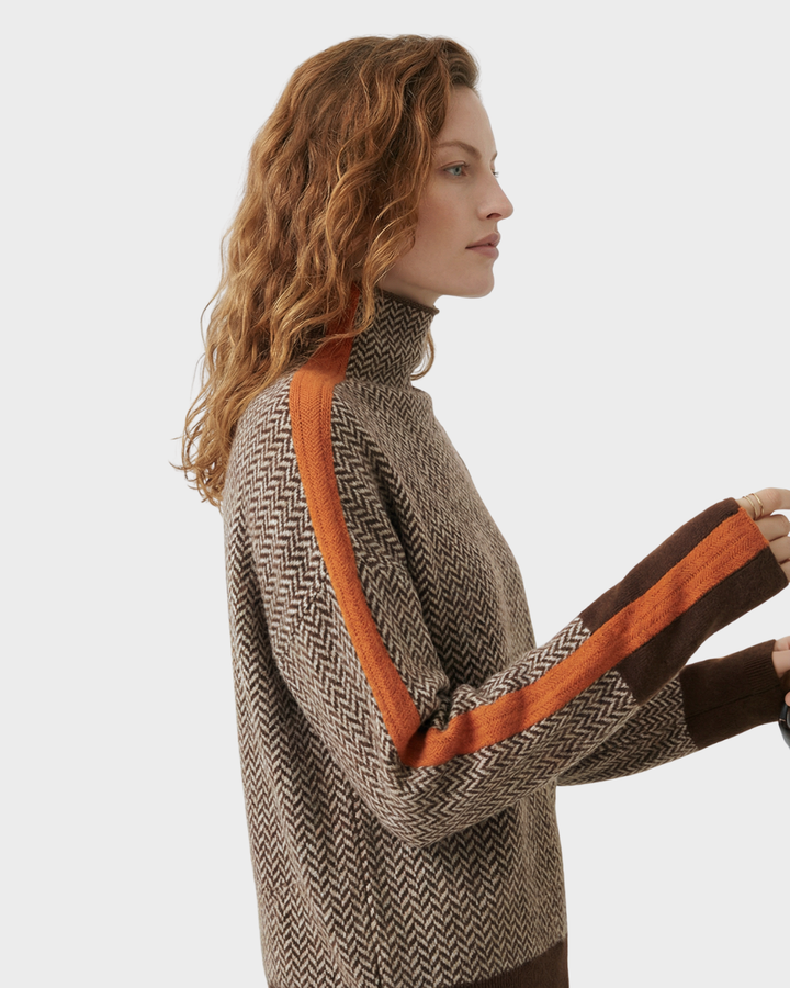 Suéter de punto de cuello alto con diseño moderno