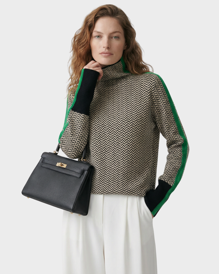 Suéter de punto de cuello alto con diseño moderno